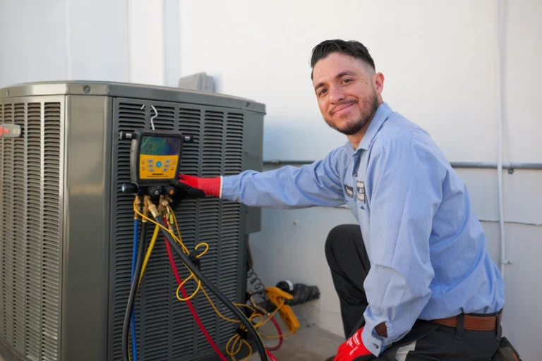 day & night tech smiling while working