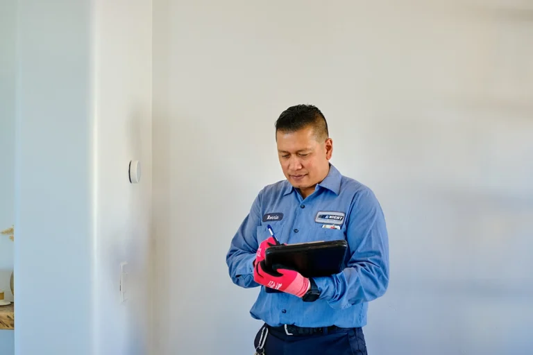 Air Conditioning Repair and Installation Services in Glendale, Arizona - Day & Night Air Conditioning, Furnace, & Plumbing day and night specialist doing an ac inspection