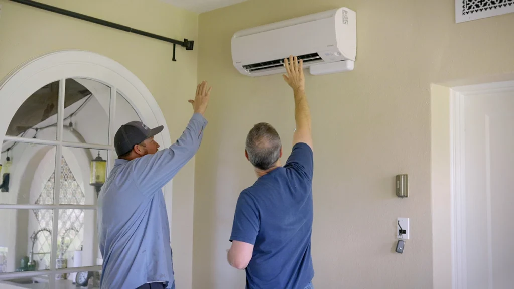 Professional Air Conditioning Repair, Maintenance, and Installation Services in Goodyear, Arizona - Day & Night Air Conditioning, Furnace, & Plumbing day and night air techs working on mini split