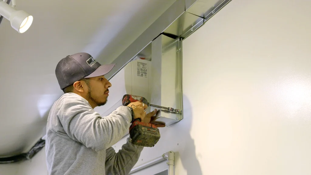 Air Conditioning Repair and Installation Services in Glendale, Arizona - Day & Night Air Conditioning, Furnace, & Plumbing day and night air techs working on mini split