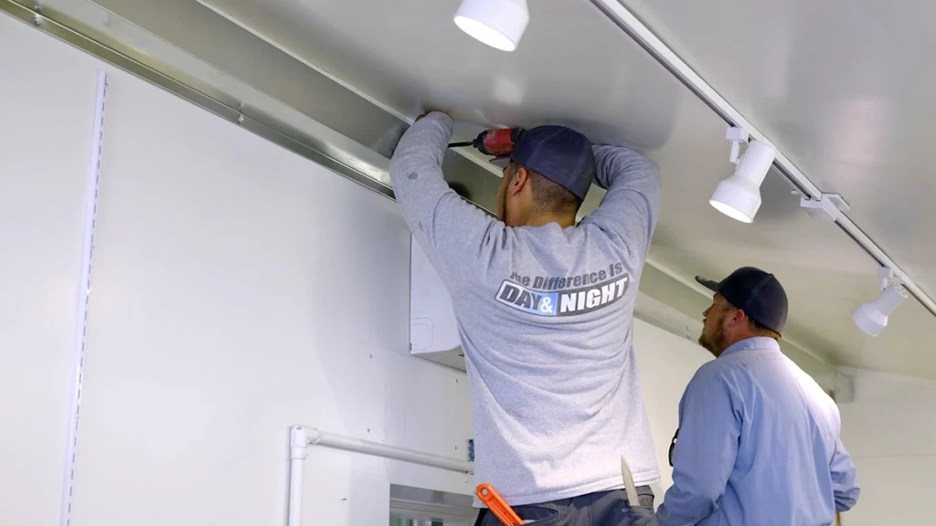 Air Conditioning Repair and Installation Services in Gilbert, Arizona - Day & Night Air Conditioning, Furnace, & Plumbing day and night air techs working on mini split