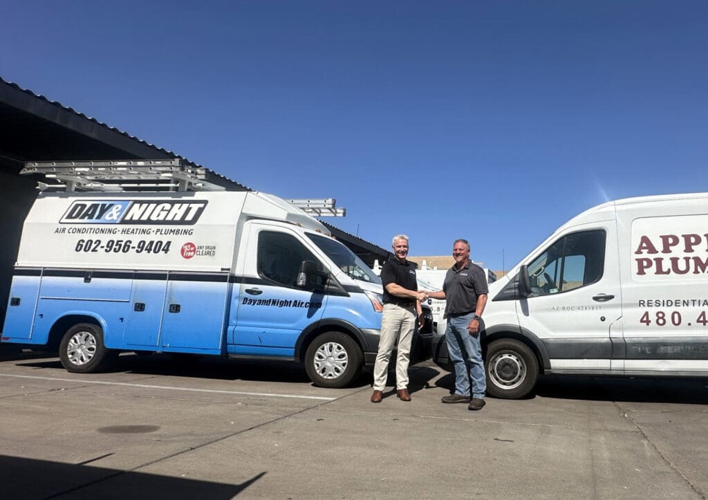 Day and Night HVAC vans with Apple Plumbing van