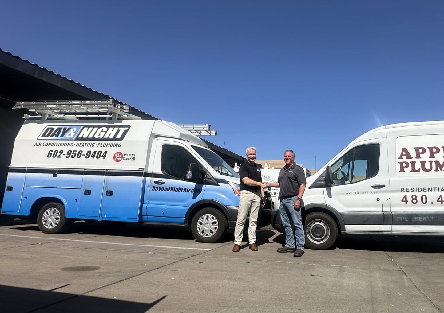 Day and Night HVAC vans with Apple Plumbing van